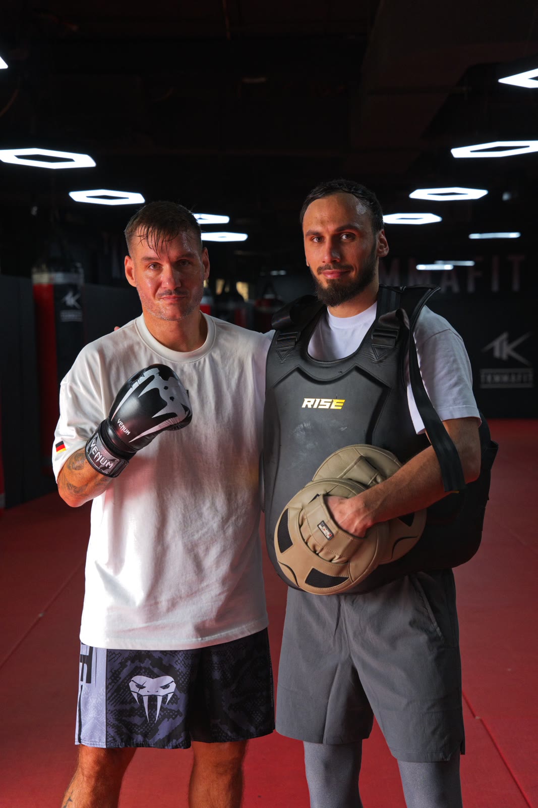Illias with a client after a training session